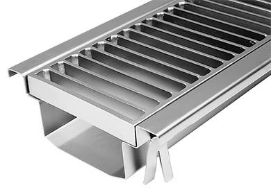 Fabrication sur mesure de systèmes d’évacuation en inox pour sol industriel à Paris